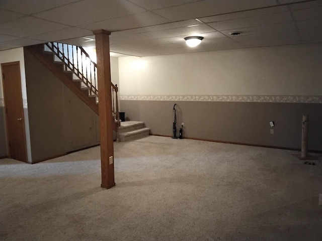W5211 Fern Ave, Montello, WI 53949 - finished below grade area featuring a drop ceiling, carpet floors, and stairs