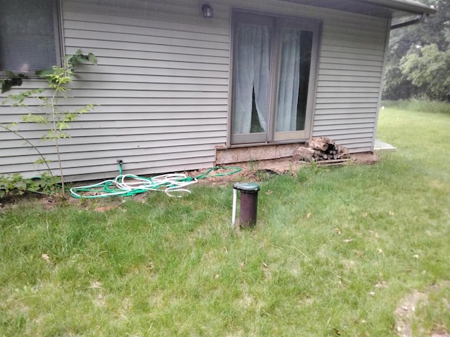 W5211 Fern Ave, Montello, WI 53949 - view of property exterior with a yard