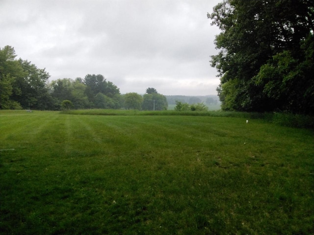 W5211 Fern Ave, Montello, WI 53949 - view of green lawn featuring a view of countryside
