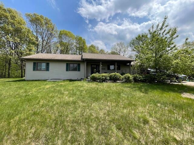 W5211 Fern Ave, Montello, WI 53949 - view of front of house with a front yard
