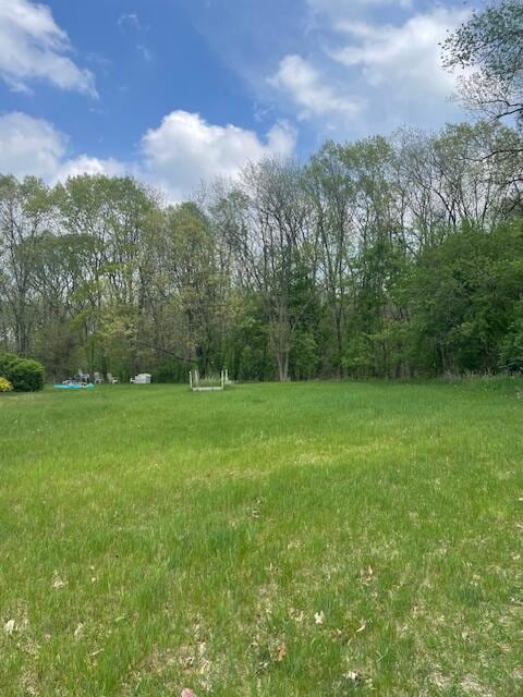 W5211 Fern Ave, Montello, WI 53949 - view of yard featuring a forest view