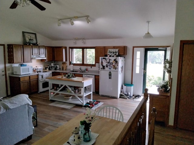 W5211 Fern Ave, Montello, WI 53949 - kitchen featuring white appliances, light countertops, ceiling fan, wood finished floors, and pendant lighting
