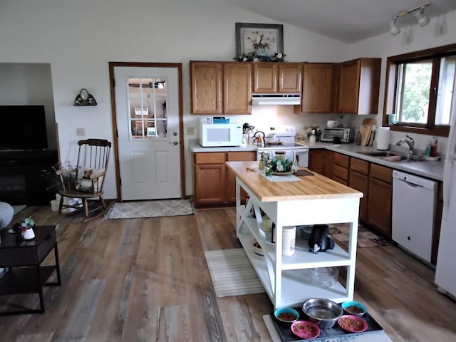 W5211 Fern Ave, Montello, WI 53949 - kitchen featuring white appliances, open shelves, butcher block counters, lofted ceiling, and brown cabinets