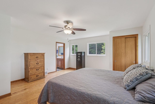 S83W27815 Beaver Trl, Mukwonago, WI 53149 - bedroom featuring light wood-style flooring, a ceiling fan, and a closet