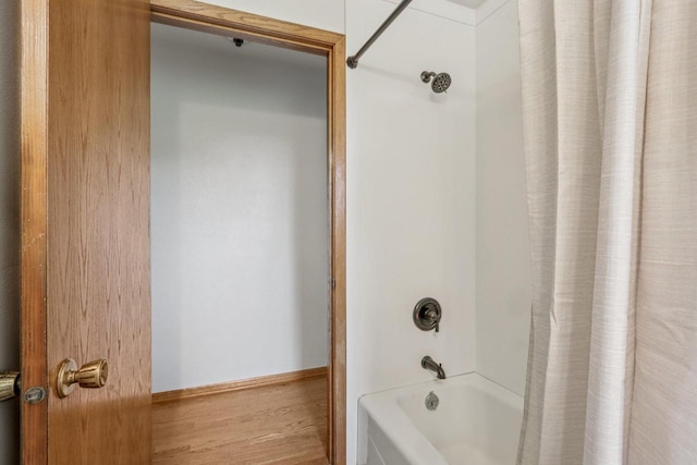 S83W27815 Beaver Trl, Mukwonago, WI 53149 - full bathroom featuring shower / tub combo and wood finished floors
