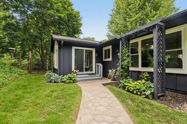 S83W27815 Beaver Trl, Mukwonago, WI 53149 - entrance to property with board and batten siding and a yard