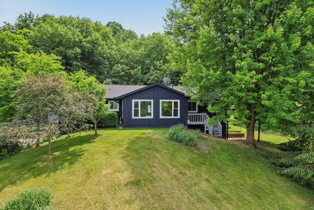 S83W27815 Beaver Trl, Mukwonago, WI 53149 - view of front of home featuring a front yard and a deck