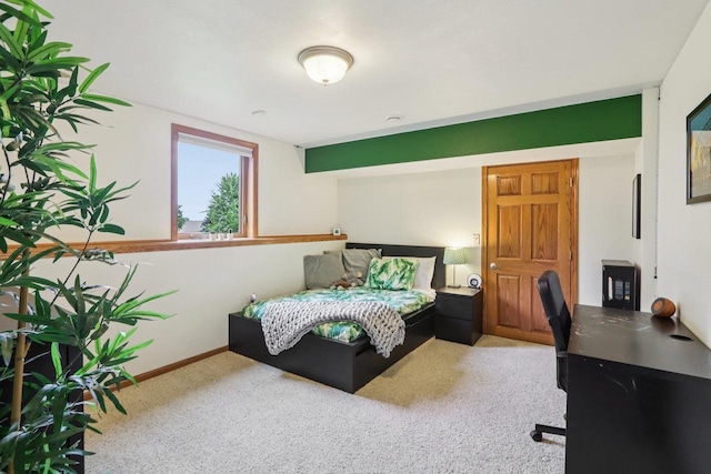 3176 Weybridge Dr, Sun Prairie, WI 53590 - carpeted bedroom with a desk and baseboards