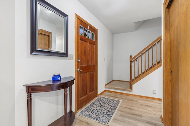 W163N10515 Ridgeview Ln, Germantown, WI 53022 - foyer entrance featuring wood finished floors and stairway