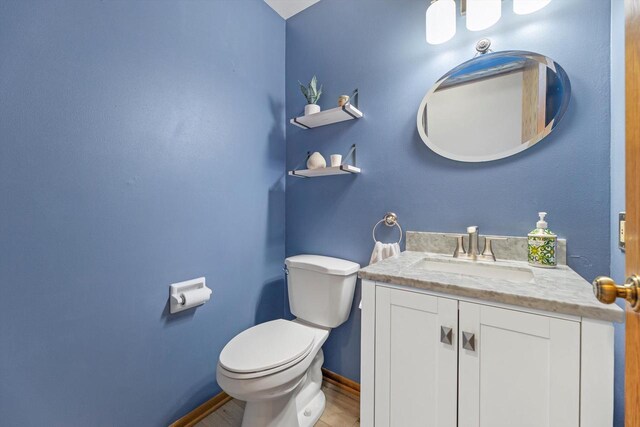W163N10515 Ridgeview Ln, Germantown, WI 53022 - bathroom featuring vanity and wood finished floors