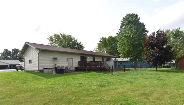 608 3rd St, Cameron, WI 54822 - back of property featuring a deck