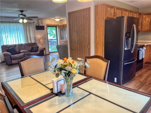 608 3rd St, Cameron, WI 54822 - dining room with wood finished floors and a ceiling fan