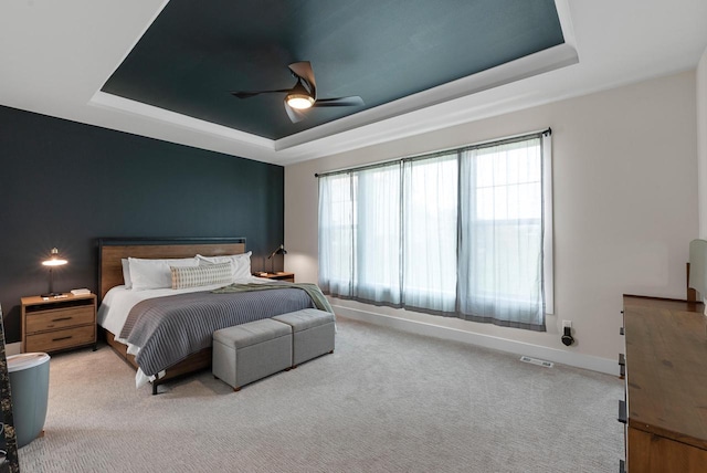 N55W19373 Red Crown Ln, Menomonee Falls, WI 53051 - carpeted bedroom with a tray ceiling and ceiling fan