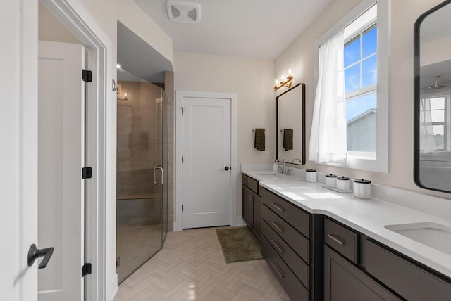 N55W19373 Red Crown Ln, Menomonee Falls, WI 53051 - full bath with double vanity and a shower stall