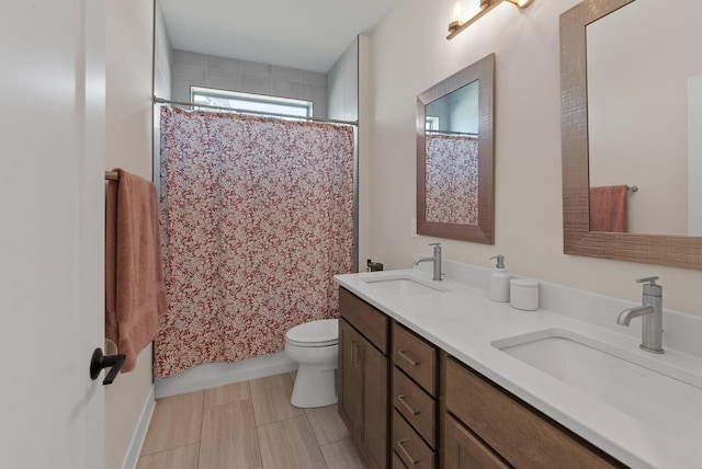 N55W19373 Red Crown Ln, Menomonee Falls, WI 53051 - bathroom with double vanity and shower / bath combo