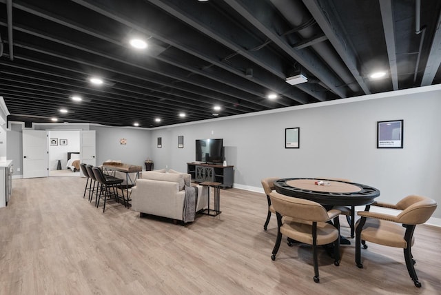 N55W19373 Red Crown Ln, Menomonee Falls, WI 53051 - living room featuring baseboards and light wood-style flooring