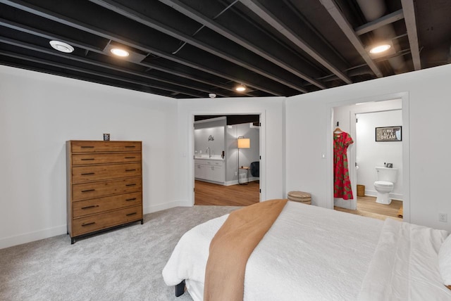 N55W19373 Red Crown Ln, Menomonee Falls, WI 53051 - bedroom featuring connected bathroom and carpet floors