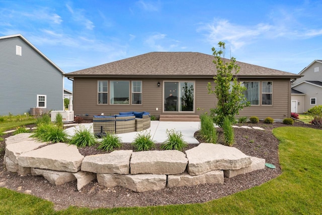 N55W19373 Red Crown Ln, Menomonee Falls, WI 53051 - rear view of property featuring an outdoor hangout area, a patio area, entry steps, and a yard