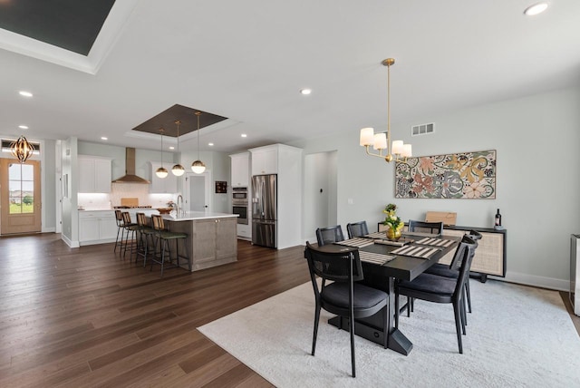 N55W19373 Red Crown Ln, Menomonee Falls, WI 53051 - dining area with a chandelier, dark wood finished floors, and recessed lighting