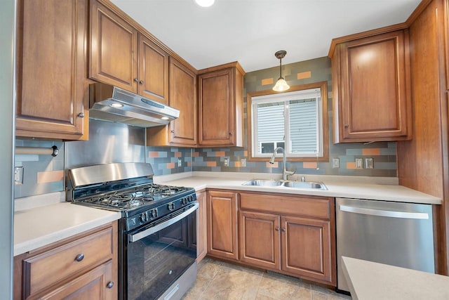 4815 Isabella Cir, Oneida, WI 54155 - kitchen featuring range with gas stovetop, dishwasher, under cabinet range hood, and brown cabinetry