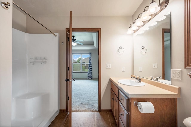 4815 Isabella Cir, Oneida, WI 54155 - bathroom featuring vanity, a shower, tile patterned flooring, and ceiling fan