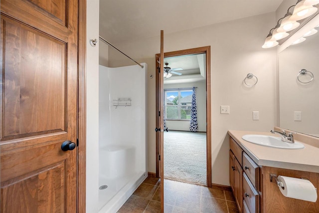 4815 Isabella Cir, Oneida, WI 54155 - bathroom featuring vanity, a shower, tile patterned floors, and ceiling fan