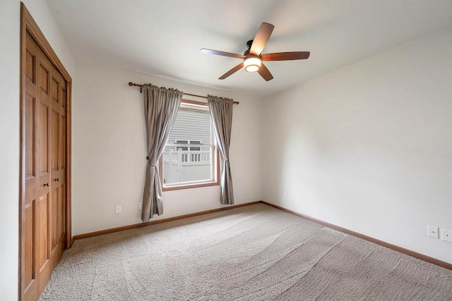 4815 Isabella Cir, Oneida, WI 54155 - unfurnished bedroom with carpet floors, a closet, and a ceiling fan