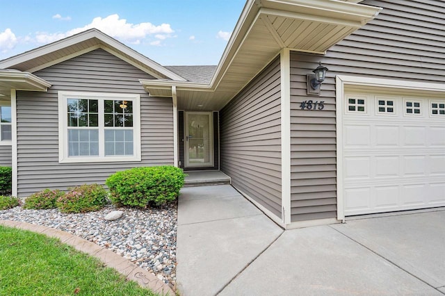 4815 Isabella Cir, Oneida, WI 54155 - doorway to property with an attached garage
