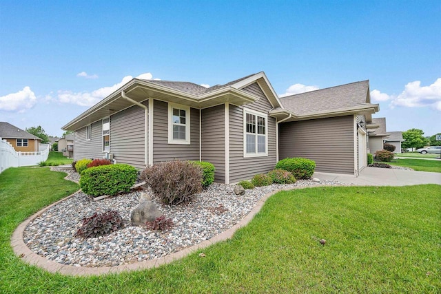 4815 Isabella Cir, Oneida, WI 54155 - view of side of property featuring driveway and an attached garage