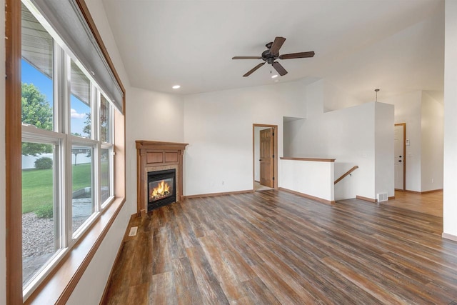 4815 Isabella Cir, Oneida, WI 54155 - unfurnished living room with dark wood-style floors, high vaulted ceiling, a fireplace, recessed lighting, and a ceiling fan