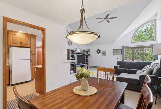 735 Cherokee Path, Lake Mills, WI 53551 - dining space with ceiling fan, high vaulted ceiling, a wall unit AC, light tile patterned flooring, and a baseboard radiator
