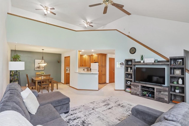 735 Cherokee Path, Lake Mills, WI 53551 - living room featuring ceiling fan, light colored carpet, and high vaulted ceiling