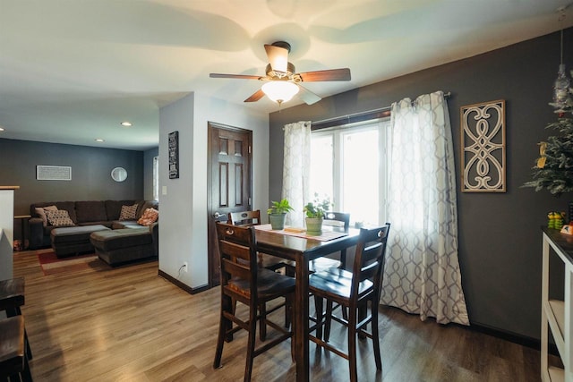 215 Marcoe St, Fond Du Lac, WI 54937 - dining space featuring wood finished floors, a ceiling fan, and recessed lighting