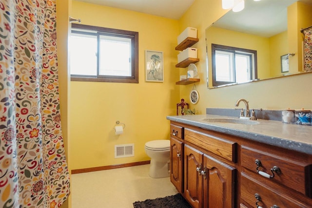 215 Marcoe St, Fond Du Lac, WI 54937 - full bath featuring healthy amount of natural light, vanity, and a shower with shower curtain