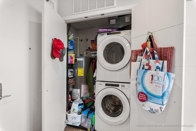 324 N Lake St Unit 204, Port Washington, WI 53074 - laundry room featuring stacked washer / drying machine and electric water heater