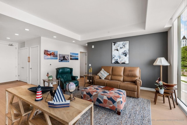324 N Lake St Unit 204, Port Washington, WI 53074 - living room featuring healthy amount of natural light, recessed lighting, and light wood-style flooring