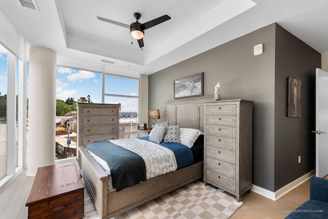 324 N Lake St Unit 204, Port Washington, WI 53074 - bedroom with a raised ceiling and ceiling fan