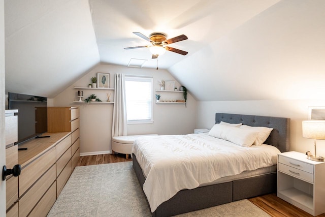 10610 W Rogers St, West Allis, WI 53227 - bedroom with wood finished floors, a ceiling fan, and lofted ceiling