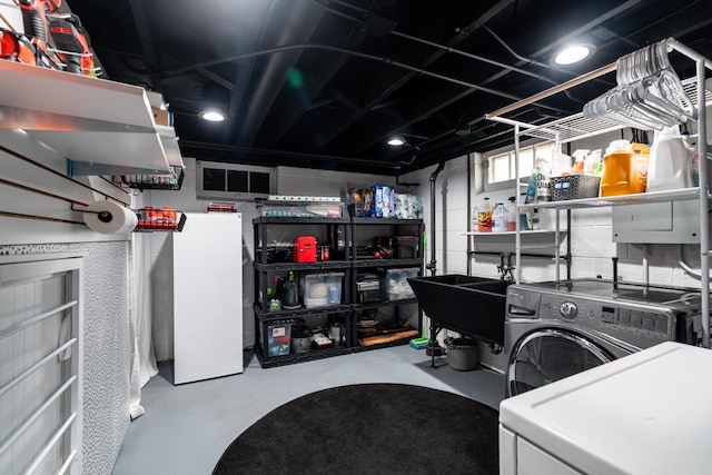 10610 W Rogers St, West Allis, WI 53227 - finished basement with washer and clothes dryer and a sink