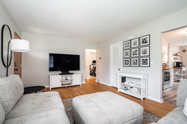 10610 W Rogers St, West Allis, WI 53227 - living room featuring wood finished floors