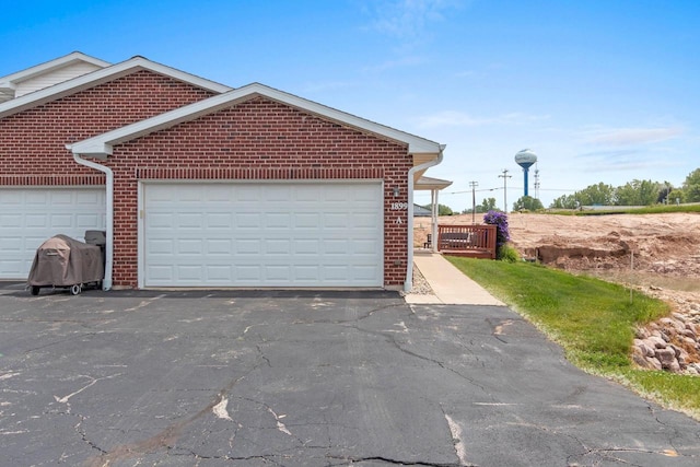 1899 Riverside Dr Unit A, Suamico, WI 54313 - garage with asphalt driveway