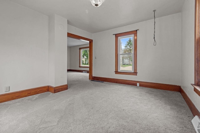 102 10th St, Clintonville, WI 54929 - carpeted spare room with baseboards