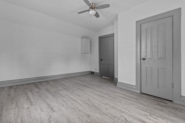 102 10th St, Clintonville, WI 54929 - empty room with a ceiling fan and wood finished floors