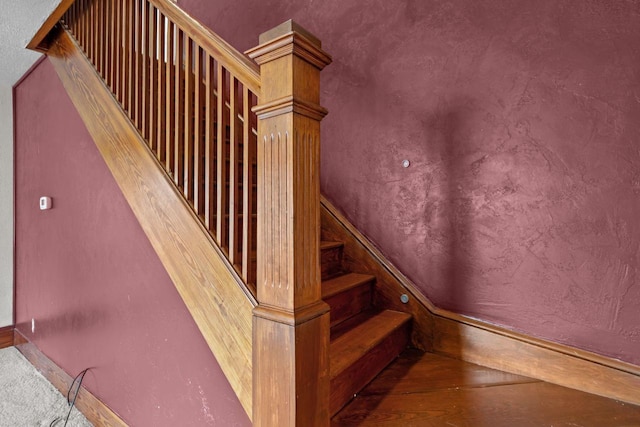 102 10th St, Clintonville, WI 54929 - stairway featuring baseboards and wood finished floors