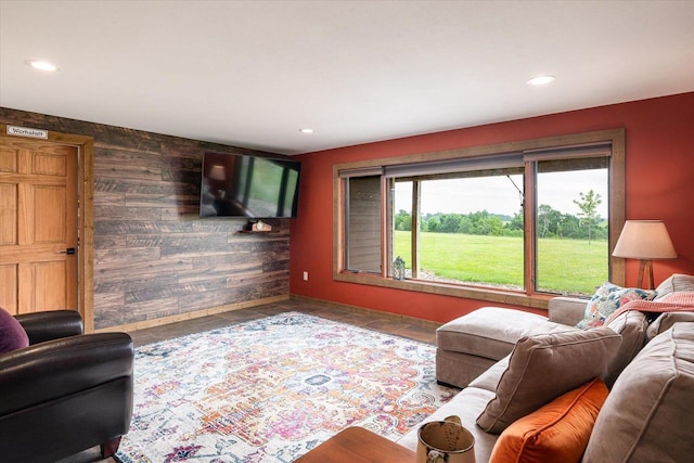 S3358 Hass Ln, Viroqua, WI 54618 - living room featuring an accent wall, recessed lighting, and wood walls