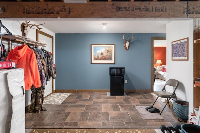 S3358 Hass Ln, Viroqua, WI 54618 - interior space featuring dark stone finish floors
