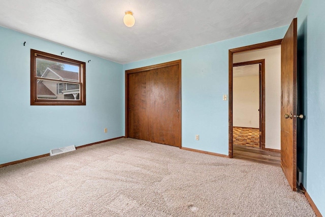 1517 Navarino St, Algoma, WI 54201 - unfurnished bedroom featuring carpet and a closet