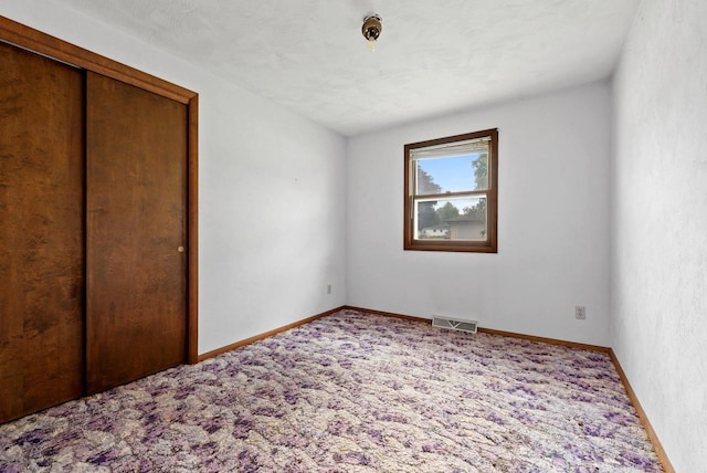 1517 Navarino St, Algoma, WI 54201 - unfurnished bedroom featuring carpet and a closet