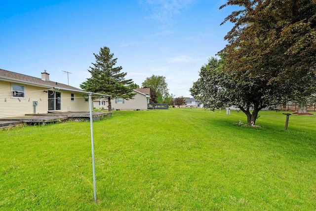 1517 Navarino St, Algoma, WI 54201 - view of green lawn with a wooden deck