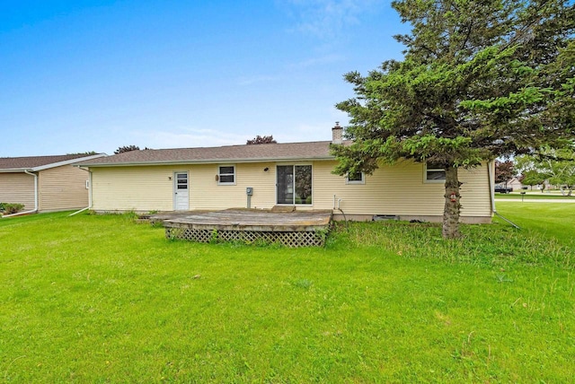 1517 Navarino St, Algoma, WI 54201 - rear view of property with a wooden deck, a yard, and a chimney